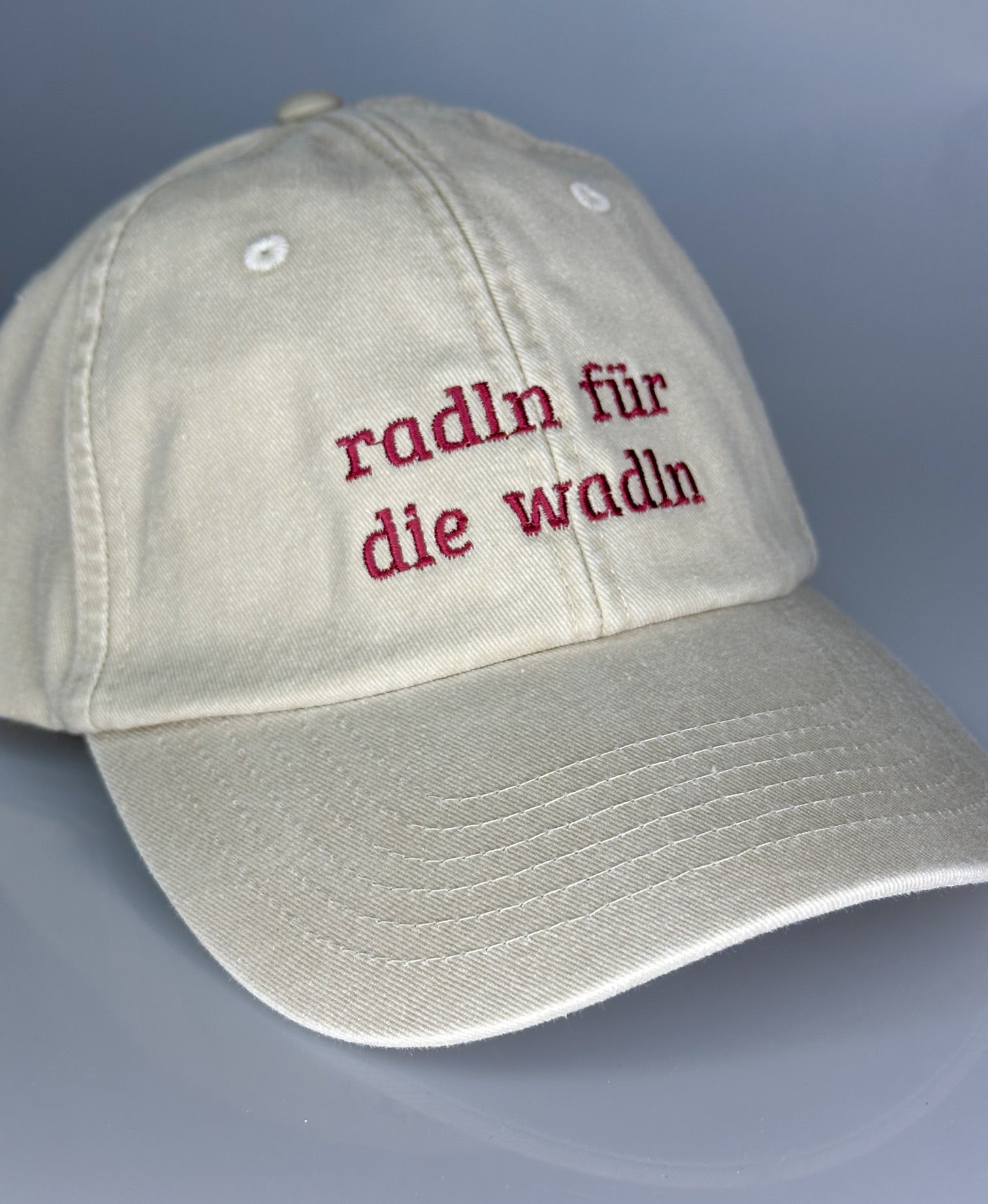 Vintage Cap ,, radln für die wadln“ sand
