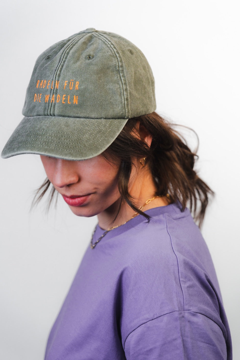 Vintage Cap ,, radln für die wadln“ green